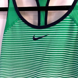 Nike Kelly green with navy trim.  Size medium